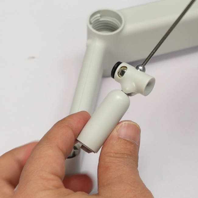 Afmonteret PTFE-slangekobling fra A1 spoleholderen