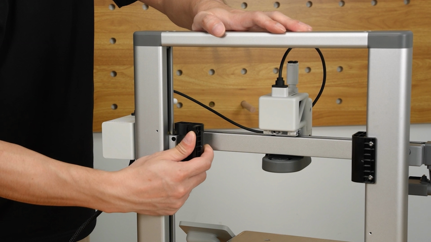 Z-aksens stopper afmonteres