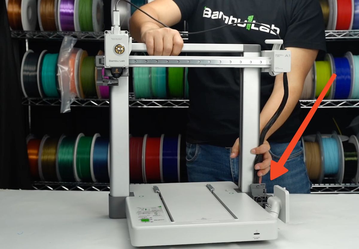 Stil A1-printeren opret igen mens sidekablerne holdes