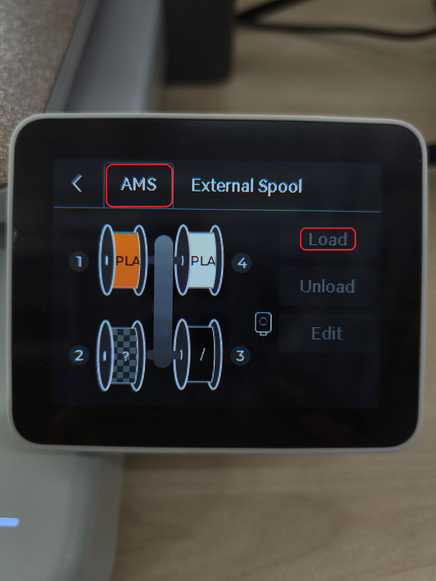 AMS-kontrolpanel med Load-knap på A1 displayet