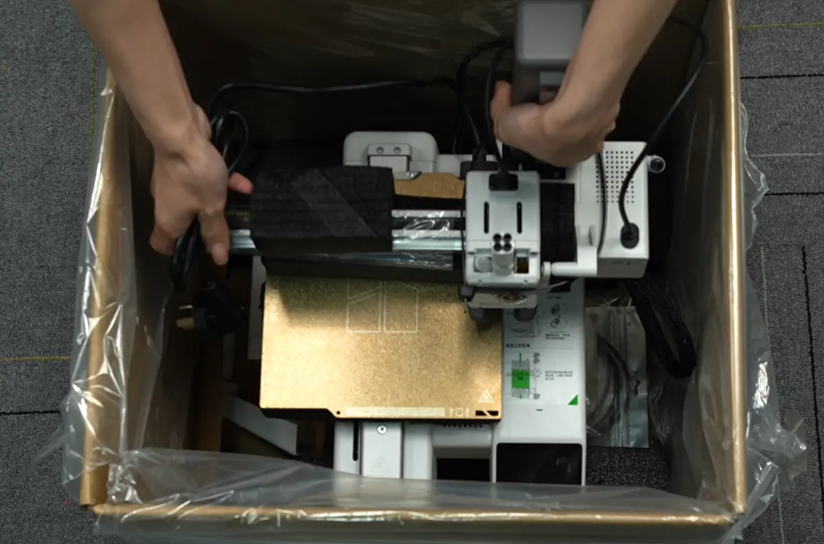 Sæt printeren tilbage i kassen