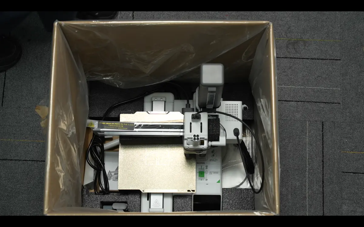 Sæt printeren tilbage i kassen
