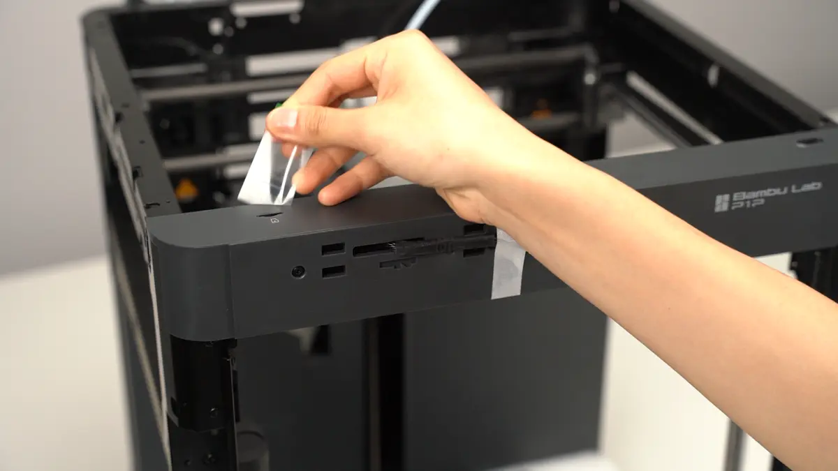 Beskyttelsesklistermærker fjernes fra printeren