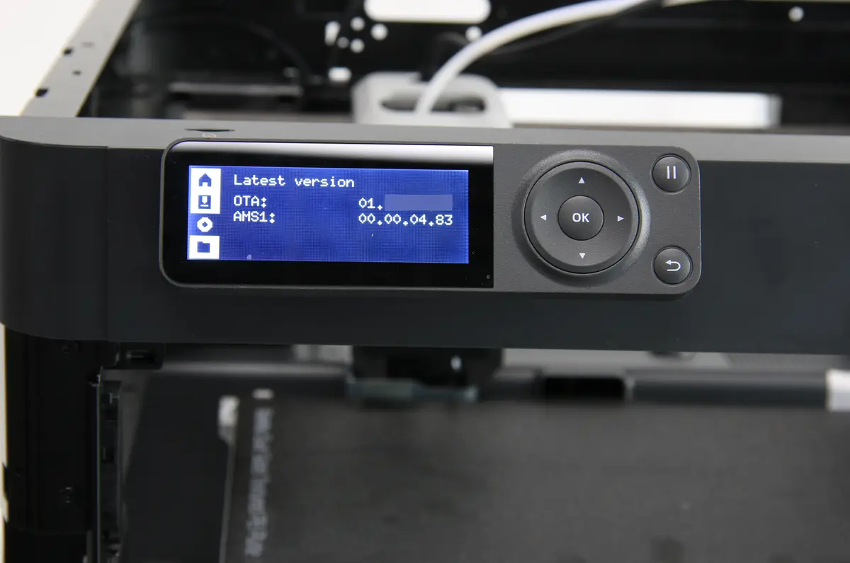 AMS-firmware-version vist i systemindstillingerne