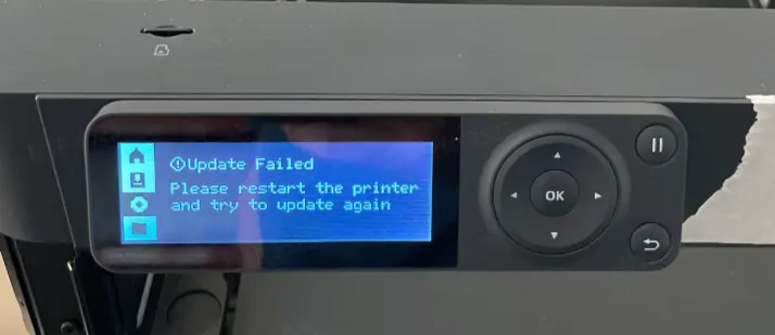 Fejlmeddelelse om mislykket firmwareopdatering paa printerens skaerm