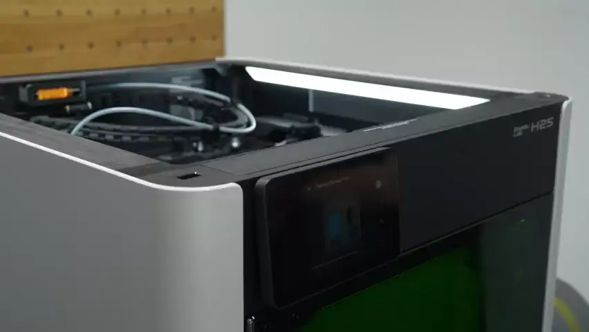 Kammerets indtagsventil øverst foran på printeren