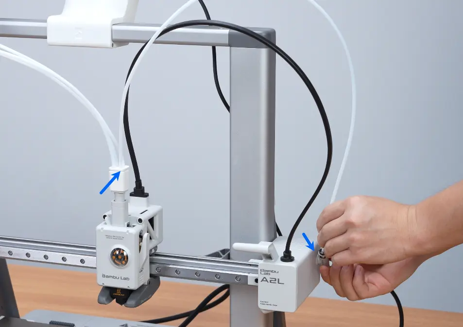 PTFE-slange forbundet fra filament hubben til koblingen