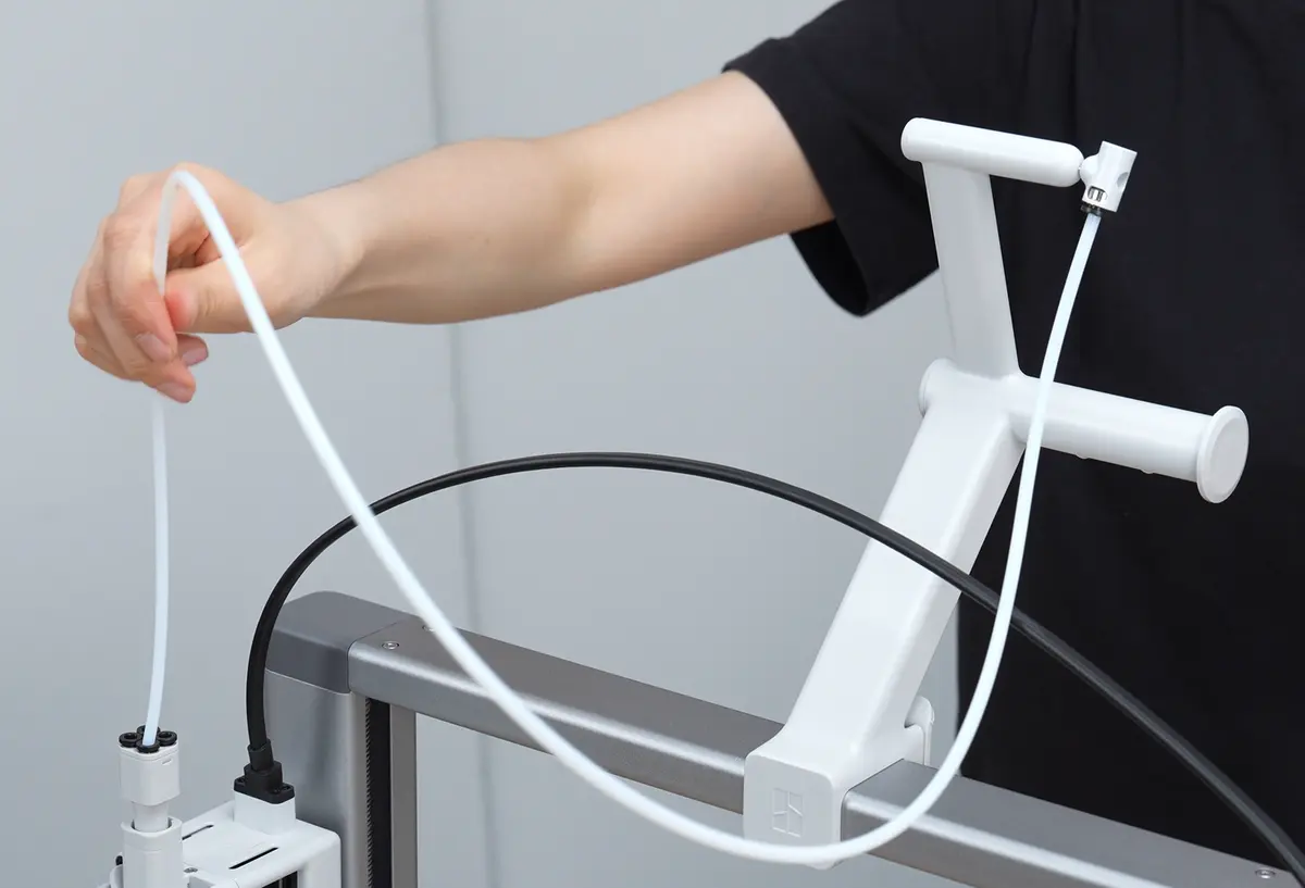 Spoleholder: tilslut PTFE-slangen