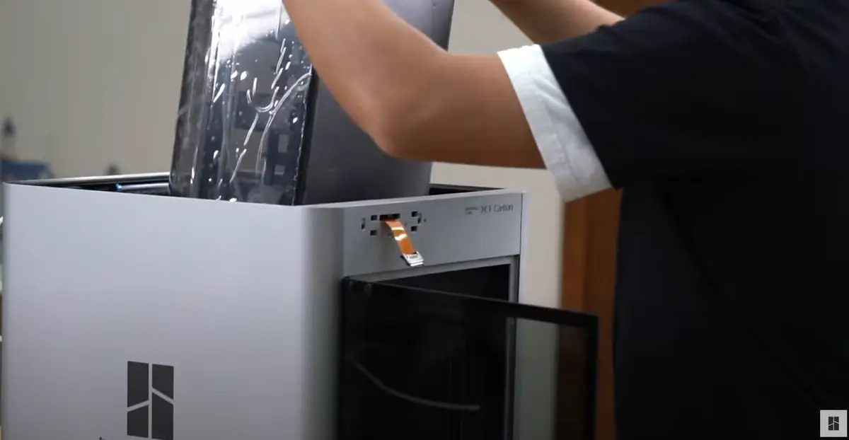 Forsigtig fjernelse af AMS-enheden fra printeren