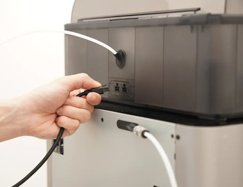 AMS-kabel frakobles inden firmwareopdatering