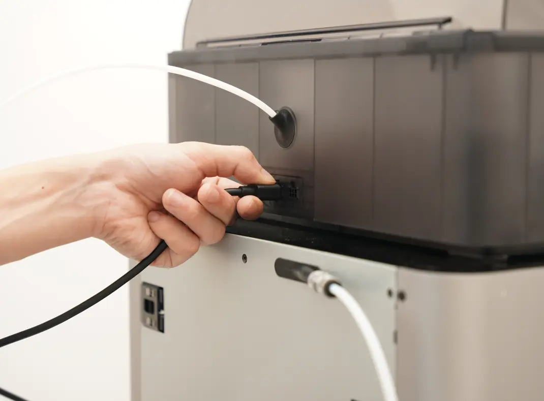 Printeren tændes med AMS tilsluttet
