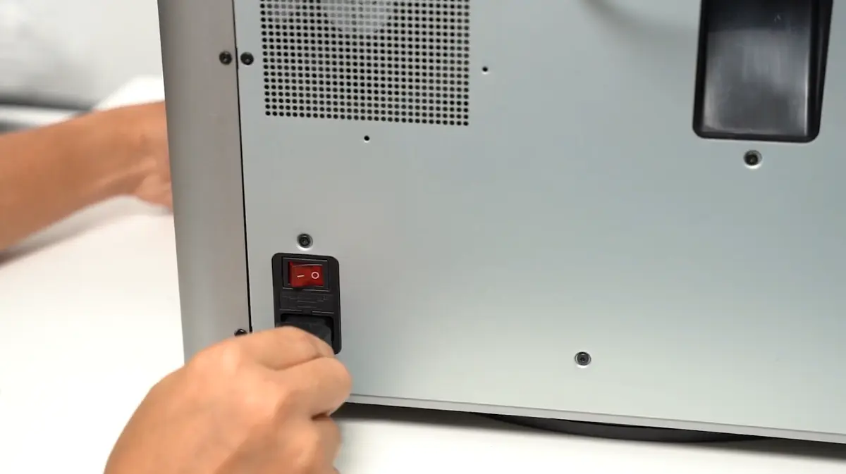 Spoleholder afmonteret fra printeren