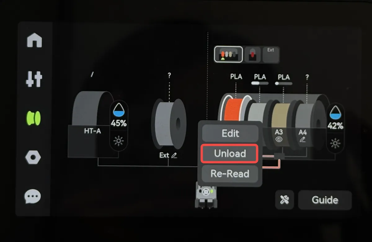 Unload-knappen på skærmen til udføring af filament