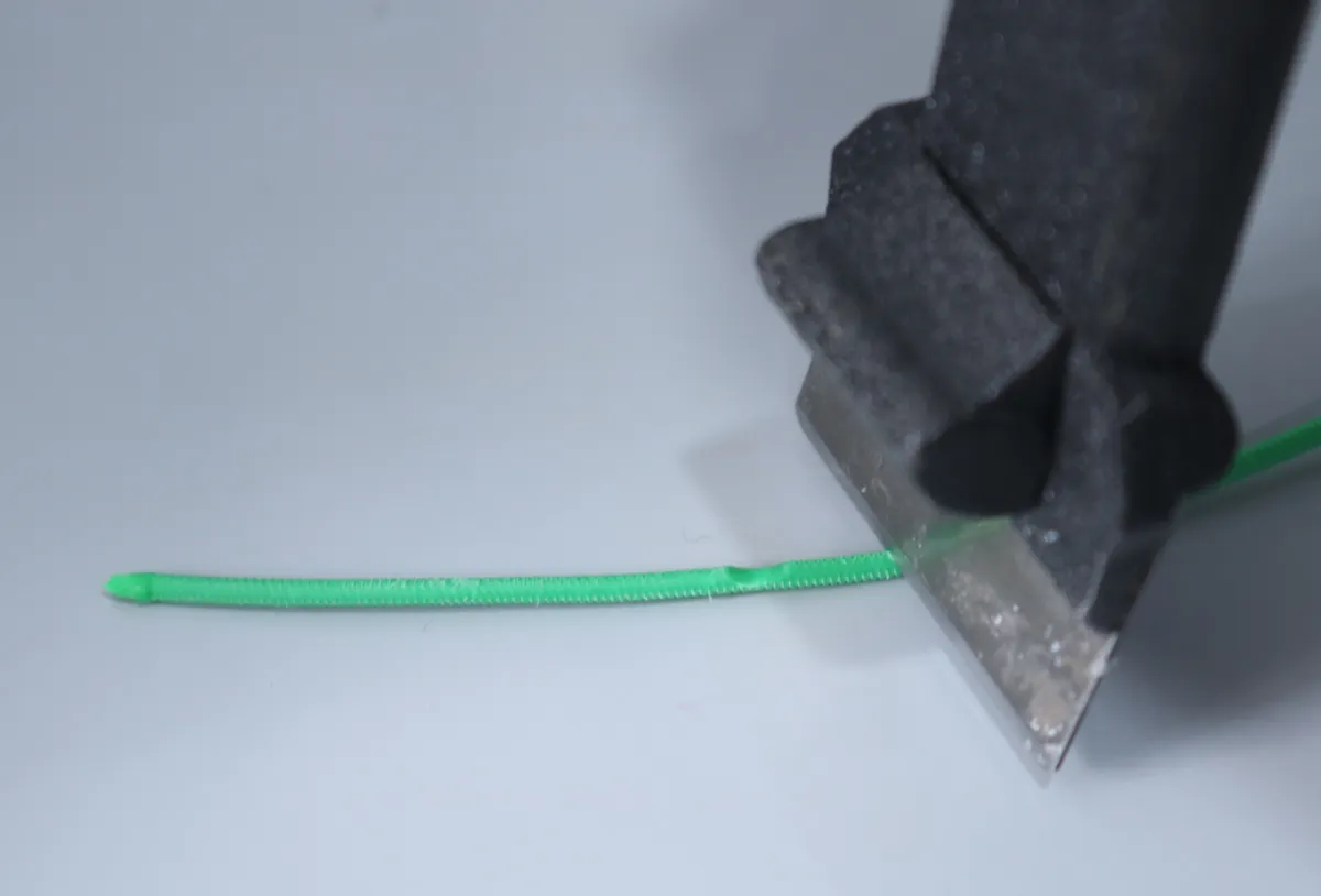 Klip det slidte stykke filament af