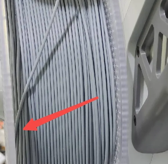Filament kilet fast på rullen