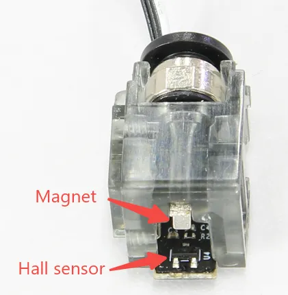 Filamentdetektionskontakt med magnet og Hall-sensor