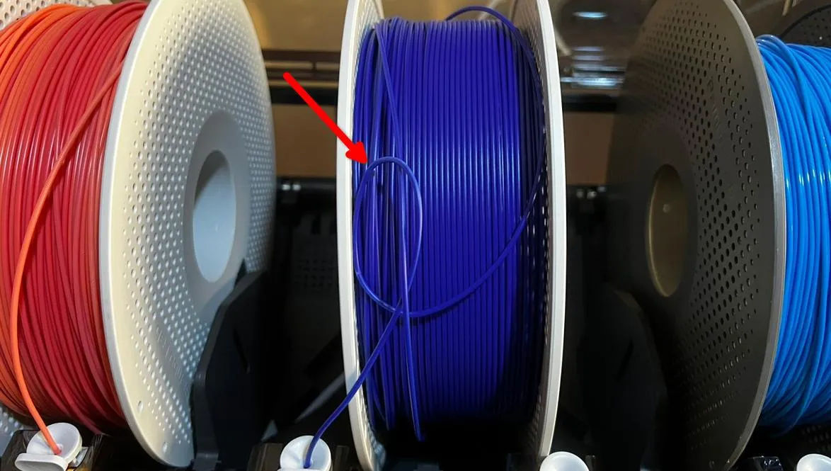 Kontrol af filament for knuder og sammenfiltring på spolen
